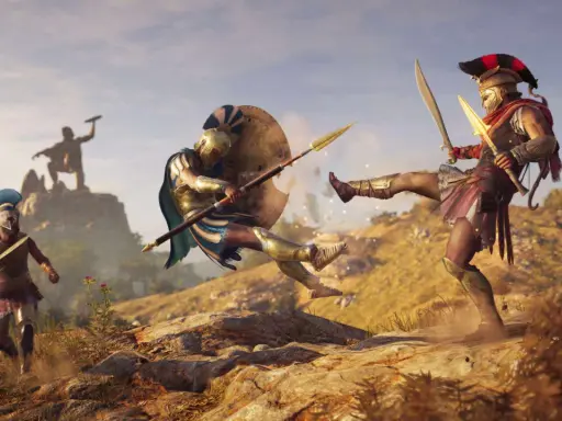 Spartanie walczą w Assassin's Creed Odyssey. Jeden z nich wykonuje kopnięcie, drugi blokuje tarczą.