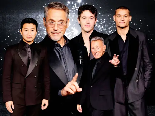 Five men in black suits with black shirts pose for a photo.