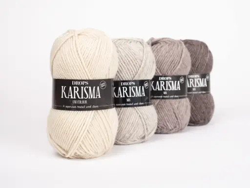 Fyra nystan Drops Karisma i olika jordnära färger. Perfekt garn för att sticka något som inte kliar.