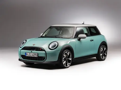Turkusowy Mini Cooper z białym dachem. Stylowy wygląd i sportowe detale, idealny do miasta. Sprawdź mini cooper dane techniczne!