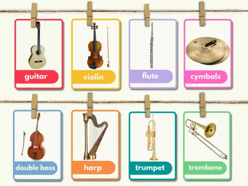Un ensemble d'images d'instruments de musique : guitare, violon, flûte, cymbales, contrebasse, harpe, trompette et trombone.