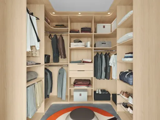 Un dressing de chambre moderne et fonctionnel, offrant une organisation parfaite pour vos vêtements et accessoires. Une belle idée dressing chambre.