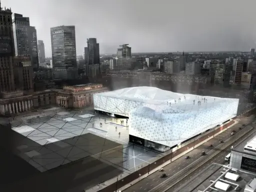 Nowoczesny budynek muzeum sztuki współczesnej w Warszawie, z charakterystyczną, geometryczną fasadą, otoczony placem i otoczeniem miejskim.