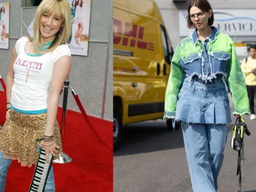 A young woman in a sparkly skirt over jeans poses on a red carpet. Another woman walks in a denim jacket with neon green sleeves, also wearing a skirt over jeans.