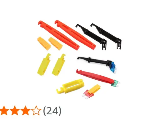 Herramientas para saber como sacar un fusible sin pinzas. Varios extractores de fusibles de plástico en rojo, amarillo y negro.