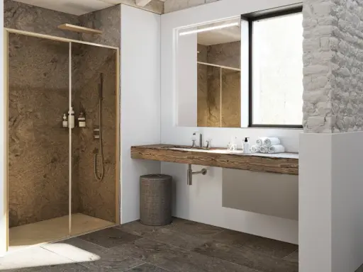 Bagno moderno con nicchia doccia in muratura effetto pietra, lavabo in legno grezzo e dettagli rustici.