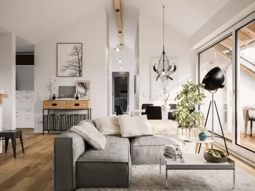 Un salon lumineux et spacieux, parfait pour **rénover mon appartement**. Canapé gris, parquet, et une grande baie vitrée donnant sur une terrasse.