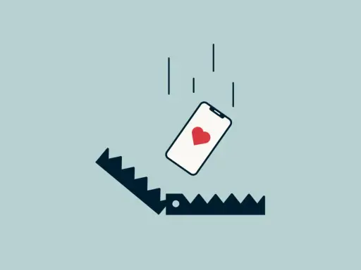 Telefon z sercem spada w pułapkę. Ilustracja symbolizuje rzeczy, o których kłamiemy na portalach randkowych, by zwabić ofiarę.