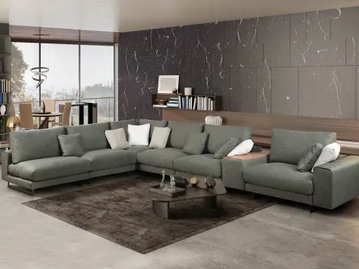 Elegante decoracion salon con sofa gris oscuro, alfombra, mesa de centro y estanterias.