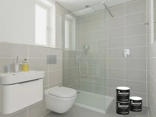 Dos latas de pintura "EMOTTION" listas para renovar el suelo del baño, con un diseño moderno y minimalista.