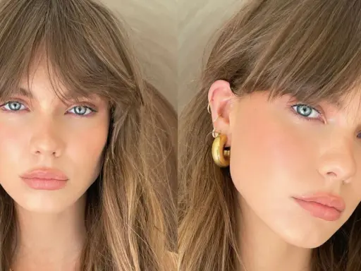 Mujer con ojos azules y cabello castaño, luciendo un "no makeup makeup look" con mejillas sonrosadas y labios naturales.