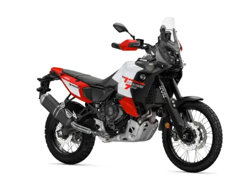 Motocykl Yamaha Ténéré 700 World Raid w kolorze białym, czerwonym i czarnym, gotowy na przygodę.