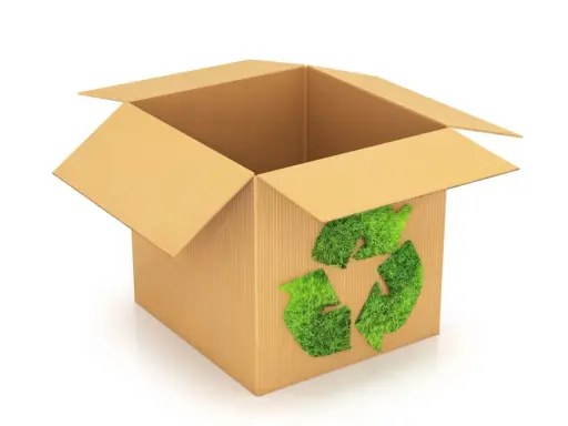 Otwarty karton z zielonym symbolem recyklingu z trawy. To przykład eko opakowania, które dba o naszą planetę.