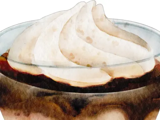 Gourmandise en verre : une onctueuse chantilly au chocolat, aux nuances douces et réconfortantes.