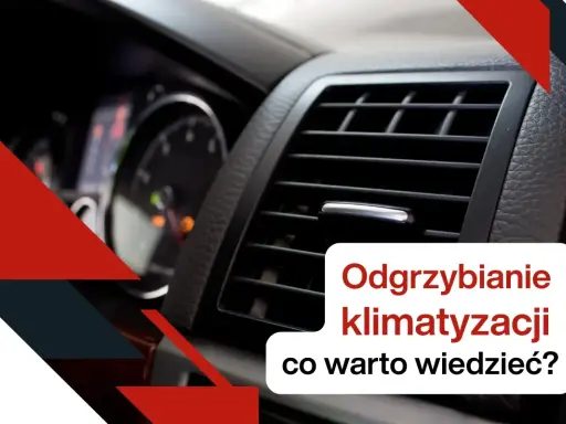 Widok na kratkę nawiewu klimatyzacji samochodowej i deskę rozdzielczą.