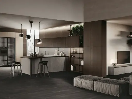 Cuisine en U ouverte sur salon, avec îlot central, tabourets et rangements intégrés. Ambiance moderne et épurée.