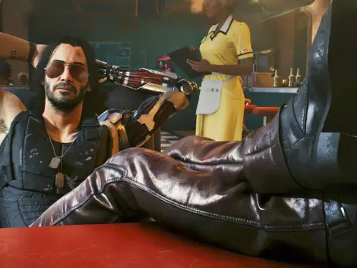 Un hombre con brazo cibernético y tatuajes, con las botas puestas sobre una mesa, como en una guía de Cyberpunk 2077.