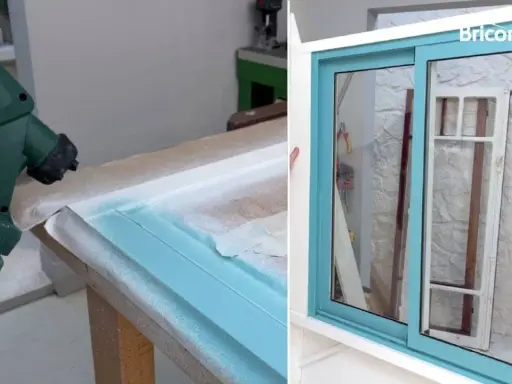 Pistola Bosch pintando marco de ventana de aluminio de color azul turquesa. El resultado es una ventana renovada y brillante.
