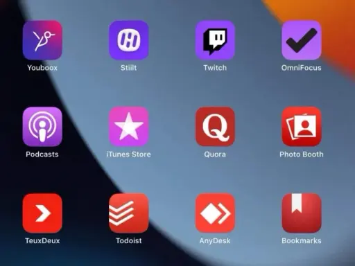 Organiser ses applications iPhone : Youboox, Stiilt, Twitch, OmniFocus, Podcasts, iTunes Store, Quora, Photo Booth, TeuxDeux, Todoist, AnyDesk, Bookmarks.