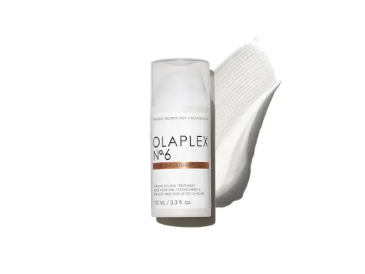 Olaplex N°6 Bond Smoother Flasche mit weißer Creme-Textur daneben.
