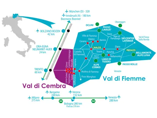 Cartina della Val di Fiemme e Val di Cembra, con i paesi principali, collegamenti stradali e ferroviari, e distanze da città come Trento e Bolzano.