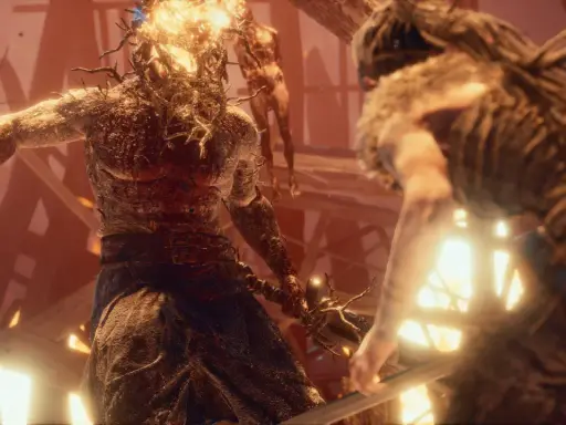 Senua walczy z potworem w płomieniach w Hellblade: Senua's Sacrifice.