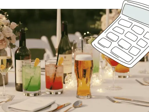 Hochzeitstisch mit Getränken und einer Rechner-Grafik. Hilft bei der Planung: wie viel wein pro person hochzeit.