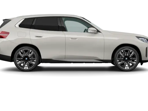 El mejor BMW, un SUV blanco elegante con llantas deportivas, se presenta en un fondo negro, listo para la aventura.