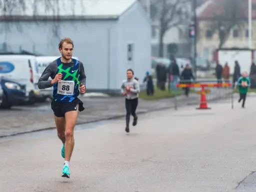 Runner with bib number 88 in a race.