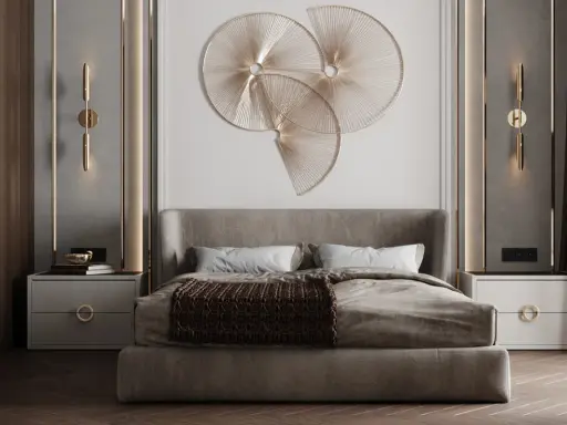 Un'installazione artistica dorata e moderna, perfetta cosa mettere sopra la testata del letto per un tocco di eleganza.