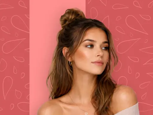 Donna con trucco impeccabile che mostra cos'è il contouring, con capelli raccolti e sfondo a tema.