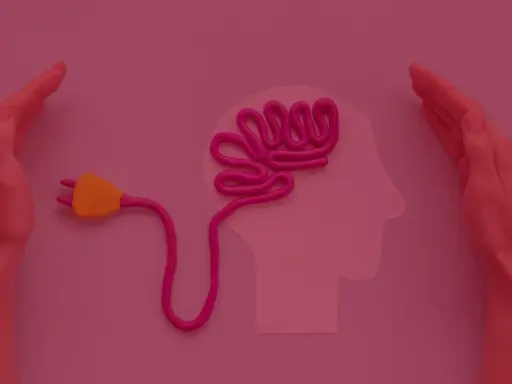 Dwie dłonie otaczają profil głowy z plastelinowym mózgiem podłączonym do wtyczki. Czy studia psychologiczne są trudne?