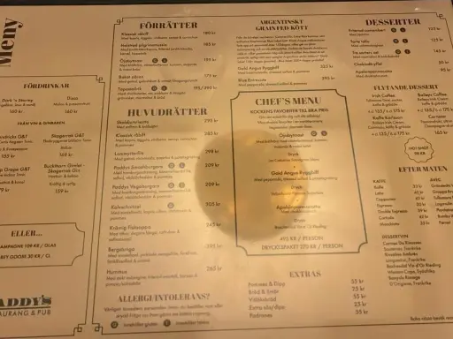 Meny med "Paddy's recensioner" som en del av menyn, med rätter som Gold Angus Ryggbiff och Paddys Smashburgare.