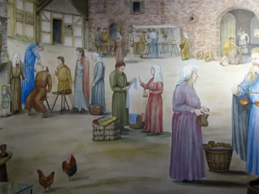 Auf einer Burg lebten Menschen verschiedenster Berufe: Händler, Schmiede und Bauern. Hier ein lebhaftes Markttreiben.