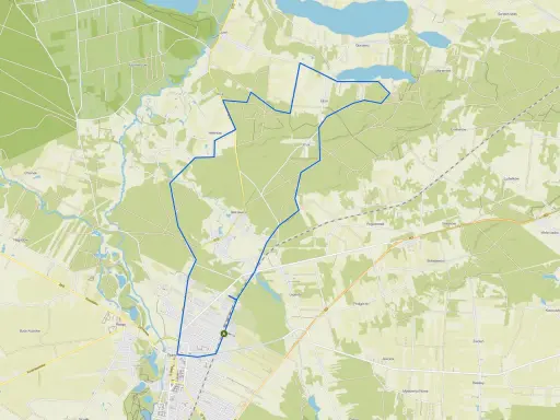 Mapa drogowa z zaznaczoną trasą wokół Gostynina. Widoczne są liczne drogi, pola, lasy i zbiorniki wodne.