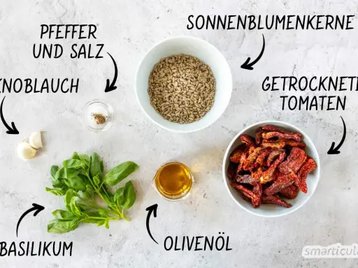 Zutaten für leckere Pesto Rezepte: Basilikum, Knoblauch, Sonnenblumenkerne, getrocknete Tomaten, Olivenöl, Pfeffer und Salz.