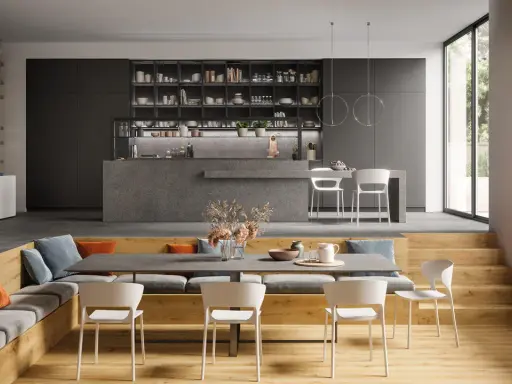 Moderna zona giorno con idee salotto e sala da pranzo insieme. Divano, libreria, cucina a isola e tavolo da pranzo con sedie bianche.