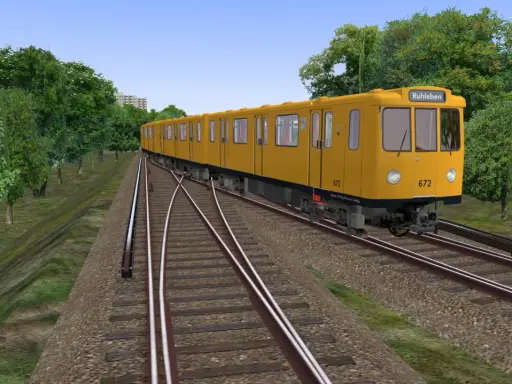 Żółty tramwaj jedzie po torach, otoczony zielenią. Sprawdź, czy Twój komputer spełnia omsi 2 wymagania, by cieszyć się taką grafiką.