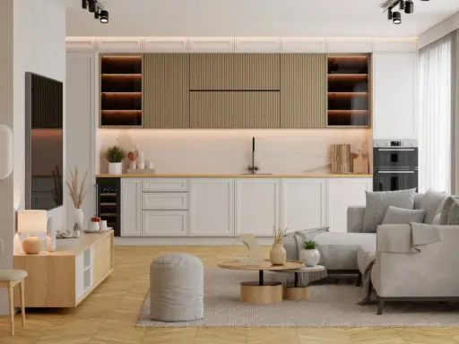 Mały salon z kuchnią aranżacje: jasne meble, szara sofa, drewniane akcenty i nowoczesne oświetlenie tworzą przytulną przestrzeń.