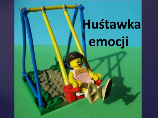 Figurka z klocków na huśtawce, symbolizująca niestabilność emocjonalną.