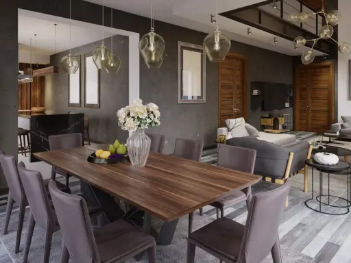 Nowoczesny salon z jadalnią. Drewniany stół z krzesłami, w tle kuchnia i wygodna sofa.