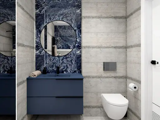 Nowoczesna granatowa łazienka inspiracje: beton, marmur i elegancka szafka.