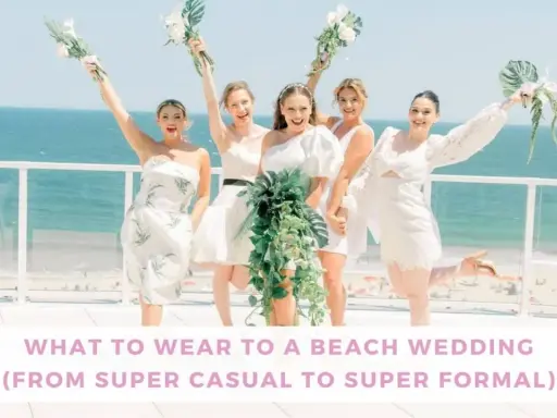 Bridesmaids in white dresses celebrate by the ocean. Thinking about what to wear to a beach wedding male? This image offers inspiration for stylish beach attire.