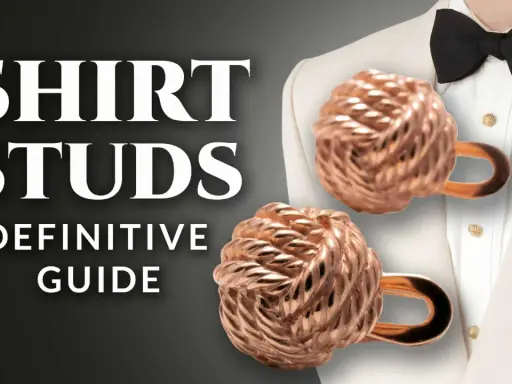 Learn how to wear tuxedo shirt studs with this definitive guide. Features knot-style studs on a formal shirt.