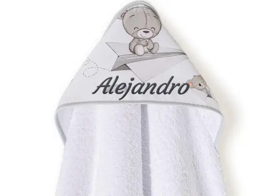 Capa de baño para bebé con osito y avión de papel. Las medidas de esta capa de baño para bebé son ideales para envolver a tu pequeño.