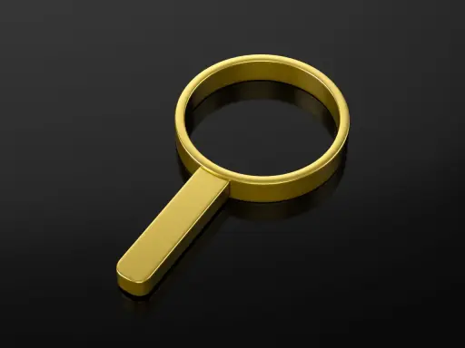Lente d'ingrandimento in **oro 24 carati** su sfondo nero lucido, simbolo di ricerca preziosa.
