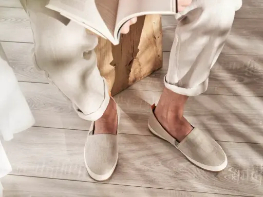 Relaxed linen pants and espadrilles in style, perfect for a casual day reading.