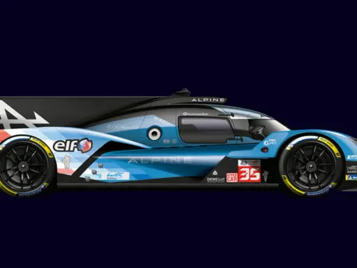 Coche Alpine A424 listo para las 24 horas de Le Mans, con patrocinadores como Elf y Michelin.