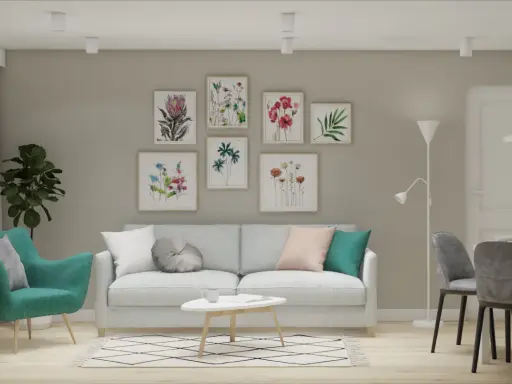 Miętowy fotel i poduszki z różem na jasnej kanapie. W tle galeria obrazów z kwiatami.