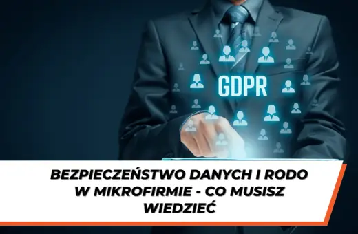 Biznesmen dotyka ekranu z napisem GDPR, symbolizującym bezpieczeństwo danych i ustawę RODO.